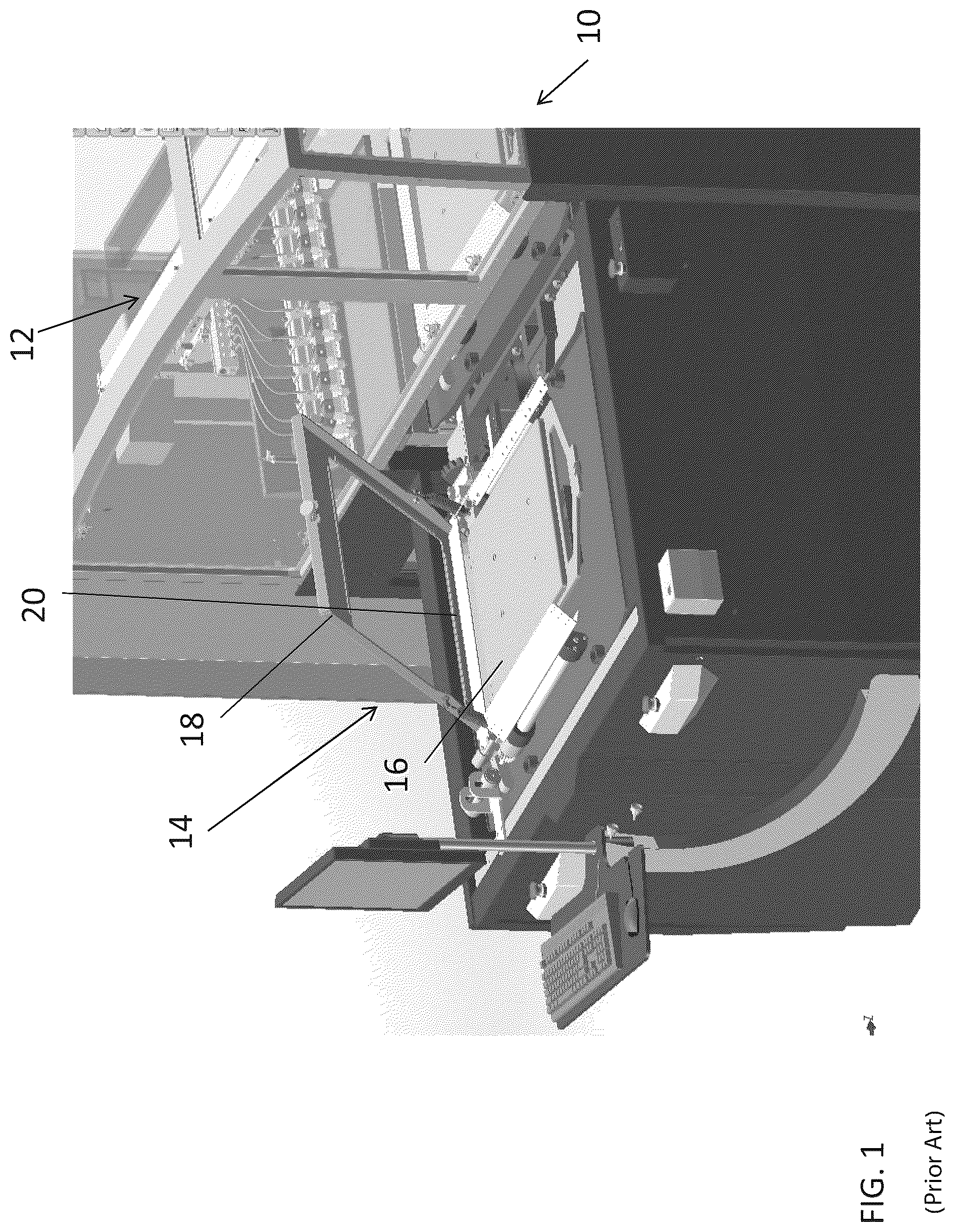Patent US12103301 Figure 1 – Automatic hold-down pallet for textile printing